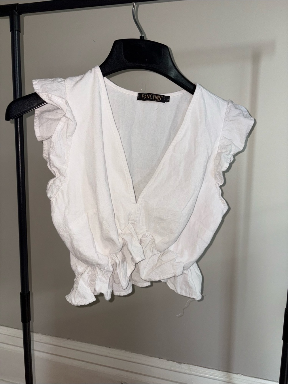 Fancyinn White V-Neck Ruffle Crop Top